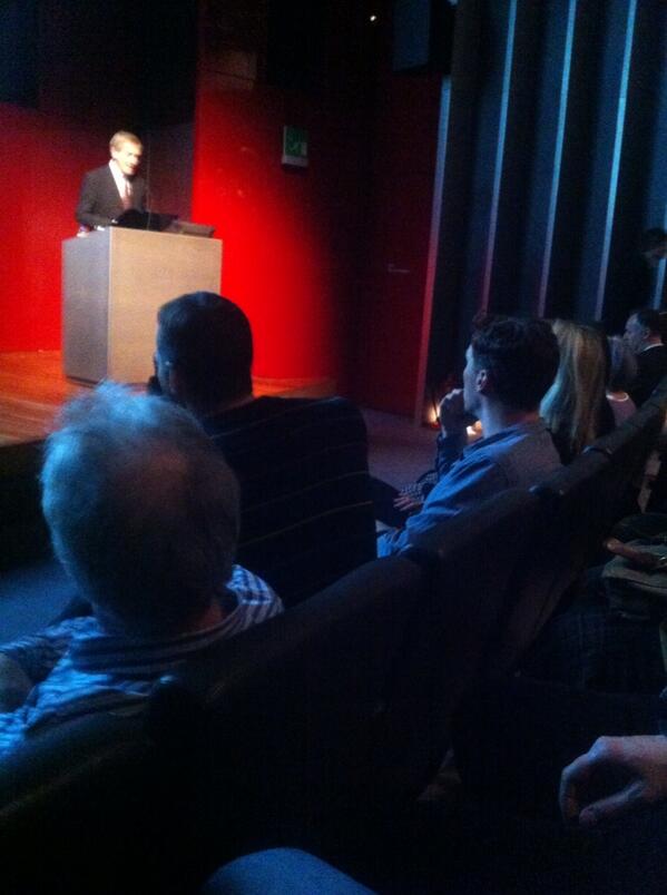 Camberbatch awaiting O'Hagan to make an entrance listens to an introduction